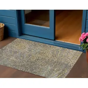 Photo of Gold And Gray Abstract Washable Indoor Outdoor Area Rug