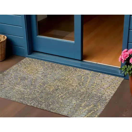 Gold And Gray Abstract Washable Indoor Outdoor Area Rug Photo 1