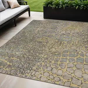 Photo of Gold And Gray Abstract Washable Indoor Outdoor Area Rug