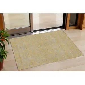Photo of Gold And Gray Abstract Washable Indoor Outdoor Area Rug