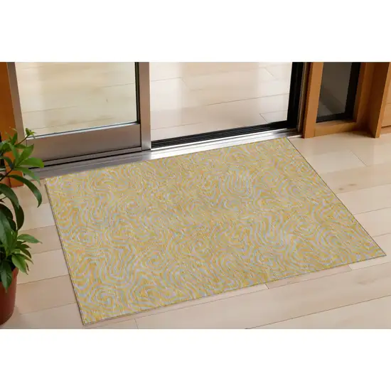 Gold And Gray Abstract Washable Indoor Outdoor Area Rug Photo 1