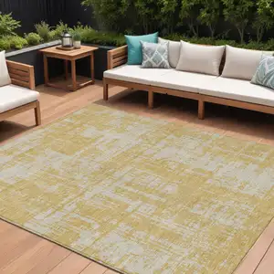 Photo of Gold And Gray Abstract Washable Indoor Outdoor Area Rug