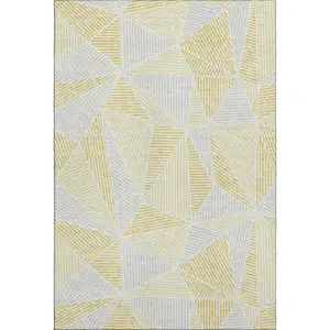 Photo of Gold And Gray Geometric Washable Area Rug With UV Protection