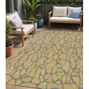 Photo of Gold And Gray Geometric Washable Indoor Outdoor Area Rug