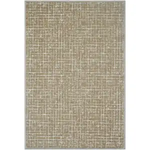 Photo of Gold And Ivory Abstract Geometric Distressed Washable Area Rug