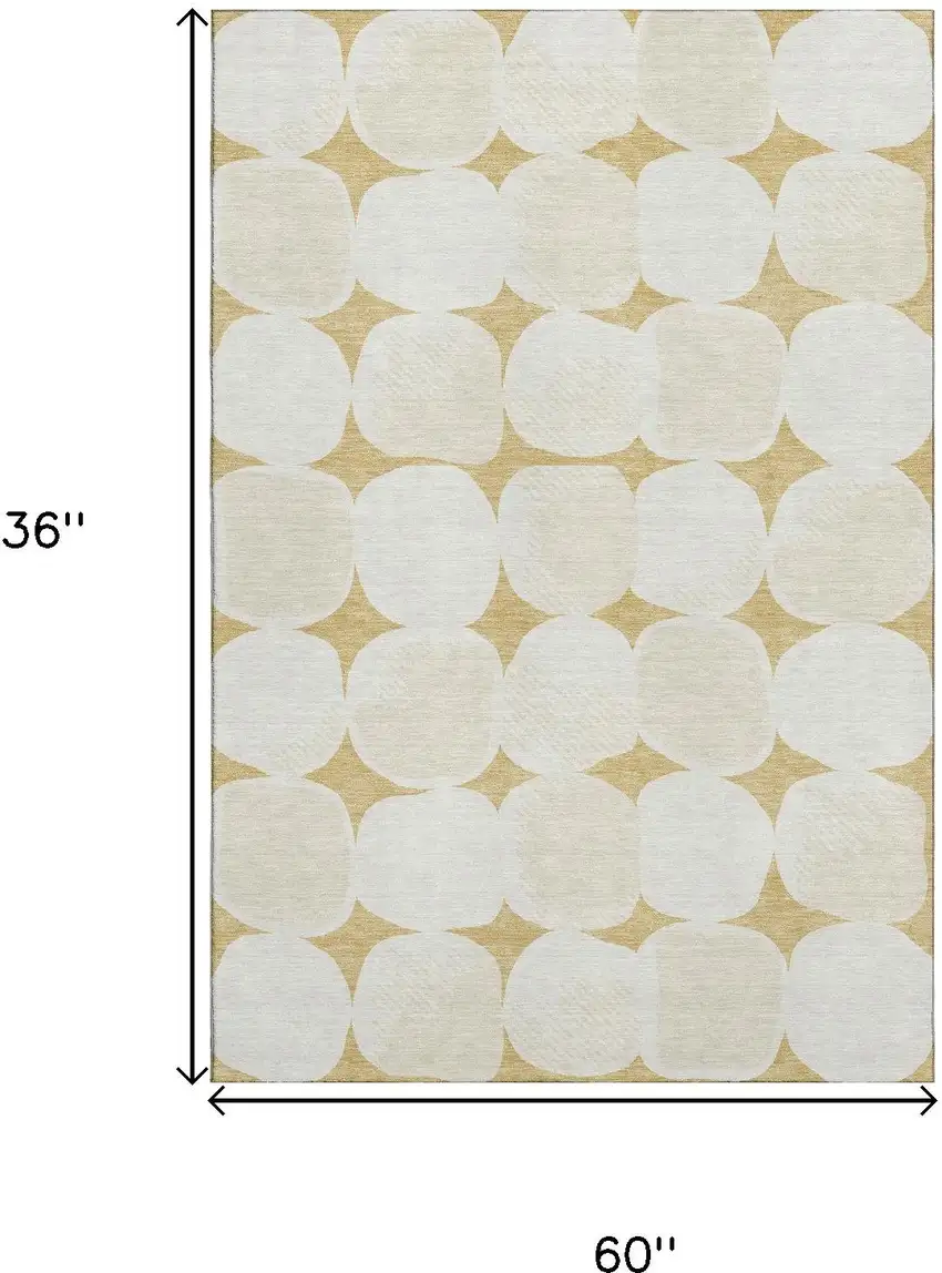 Gold And Ivory Abstract Geometric Washable Area Rug With UV Protection Photo 3