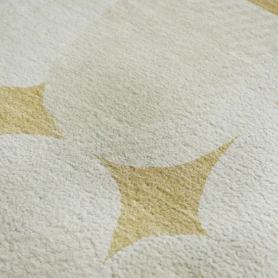 Gold And Ivory Abstract Geometric Washable Area Rug With UV Protection Photo 3