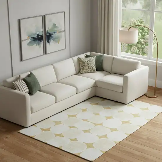 Gold And Ivory Abstract Geometric Washable Area Rug With UV Protection Photo 1