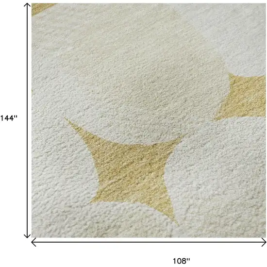 Gold And Ivory Abstract Geometric Washable Area Rug With UV Protection Photo 9