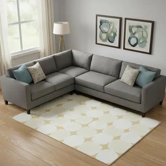 Gold And Ivory Abstract Geometric Washable Area Rug With UV Protection Photo 1