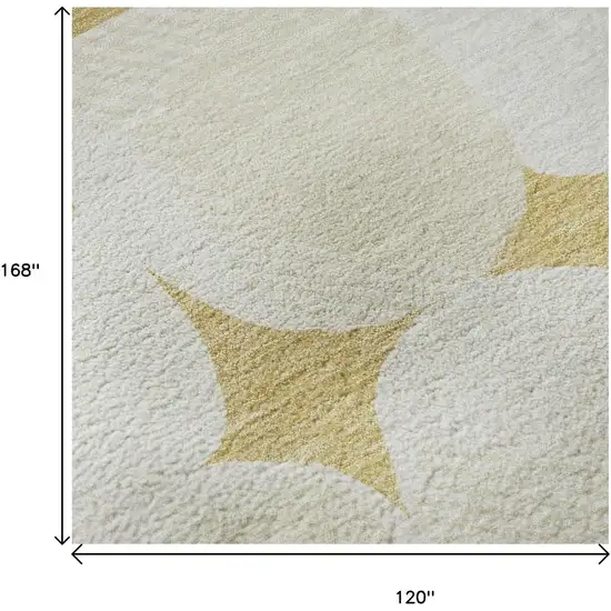 Gold And Ivory Abstract Geometric Washable Area Rug With UV Protection Photo 9