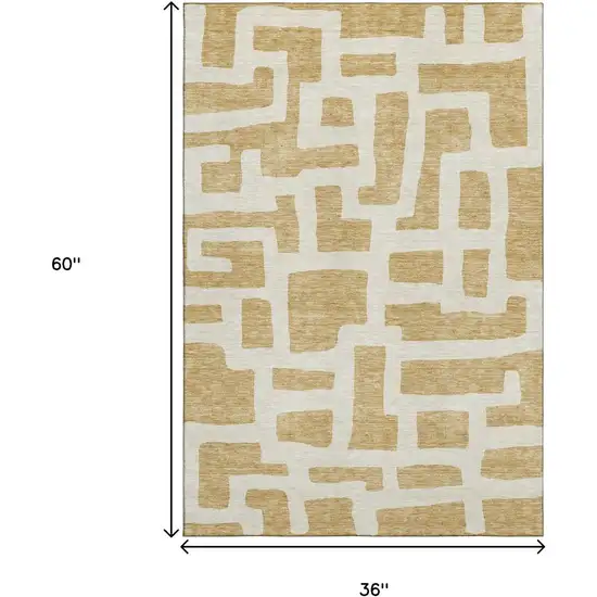 Gold And Ivory Abstract Geometric Washable Area Rug With UV Protection Photo 3