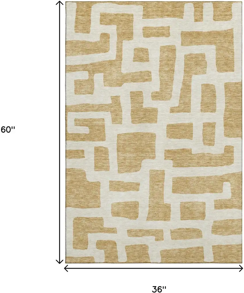 Gold And Ivory Abstract Geometric Washable Area Rug With UV Protection Photo 3