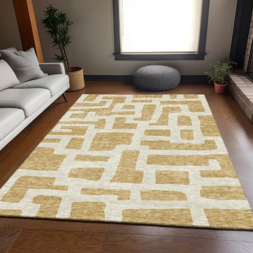 Gold And Ivory Abstract Geometric Washable Area Rug With UV Protection Photo 6