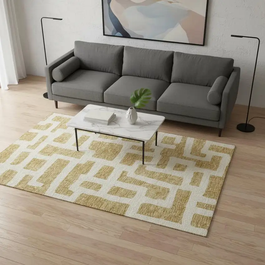 Gold And Ivory Abstract Geometric Washable Area Rug With UV Protection Photo 2