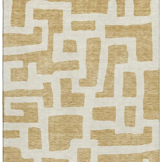 Gold And Ivory Abstract Geometric Washable Area Rug With UV Protection Photo 4