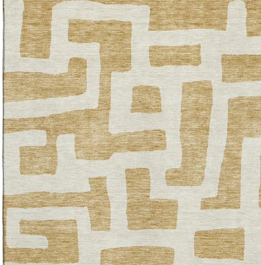 Gold And Ivory Abstract Geometric Washable Area Rug With UV Protection Photo 3