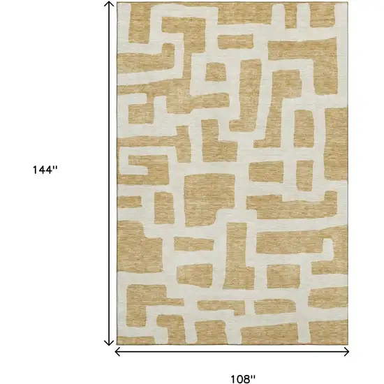 Gold And Ivory Abstract Geometric Washable Area Rug With UV Protection Photo 3