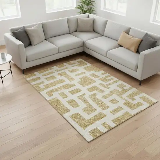 Gold And Ivory Abstract Geometric Washable Area Rug With UV Protection Photo 2
