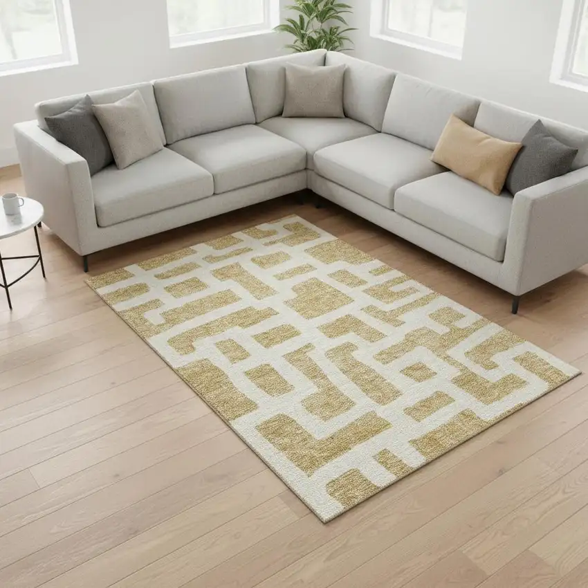 Gold And Ivory Abstract Geometric Washable Area Rug With UV Protection Photo 2