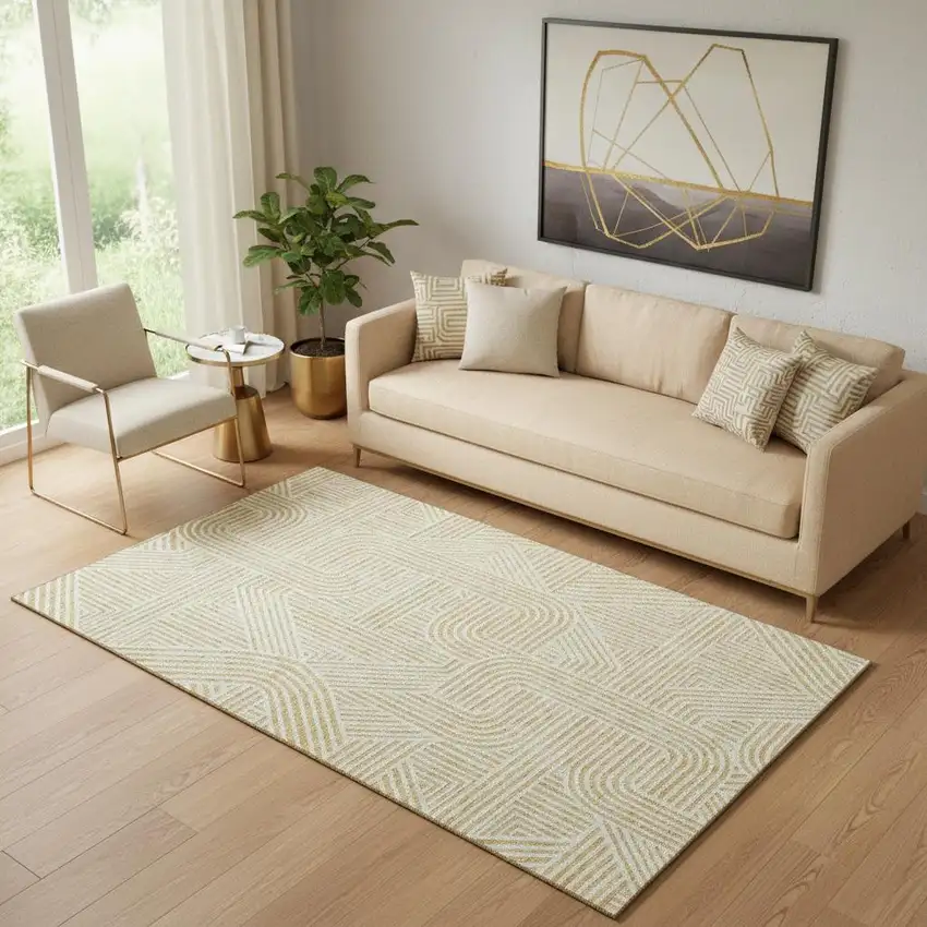 Gold And Ivory Abstract Geometric Washable Area Rug With UV Protection Photo 1