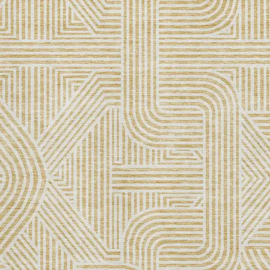 Gold And Ivory Abstract Geometric Washable Area Rug With UV Protection Photo 3