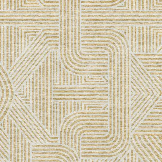 Gold And Ivory Abstract Geometric Washable Area Rug With UV Protection Photo 3