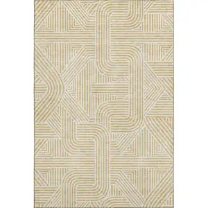 Photo of Gold And Ivory Abstract Geometric Washable Area Rug With UV Protection