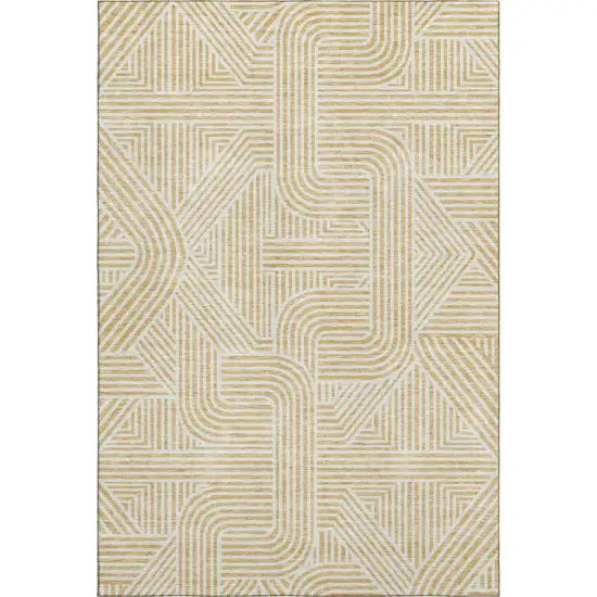 Gold And Ivory Abstract Geometric Washable Area Rug With UV Protection Photo 1