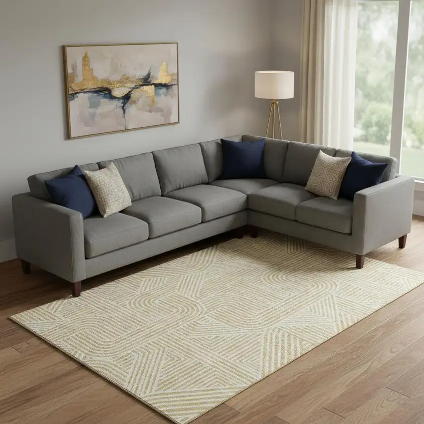 Gold And Ivory Abstract Geometric Washable Area Rug With UV Protection Photo 1