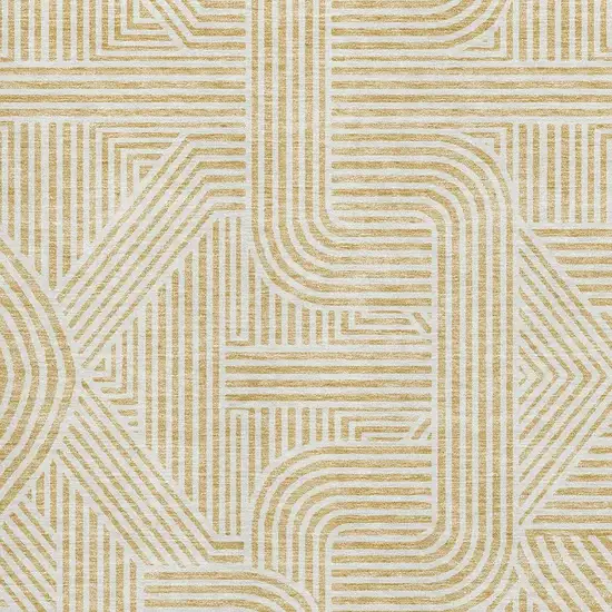 Gold And Ivory Abstract Geometric Washable Area Rug With UV Protection Photo 3