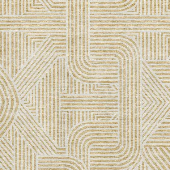 Gold And Ivory Abstract Geometric Washable Area Rug With UV Protection Photo 3
