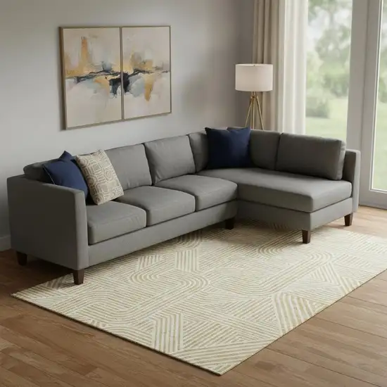 Gold And Ivory Abstract Geometric Washable Area Rug With UV Protection Photo 1