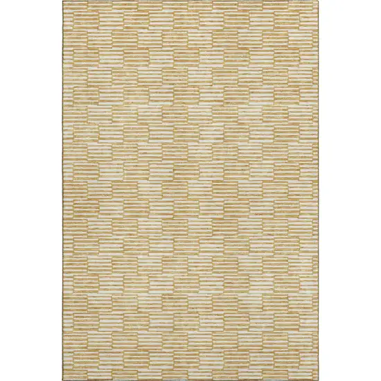 Gold And Ivory Abstract Geometric Washable Area Rug With UV Protection Photo 1