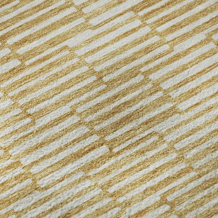 Gold And Ivory Abstract Geometric Washable Area Rug With UV Protection Photo 9