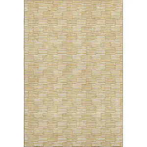 Photo of Gold And Ivory Abstract Geometric Washable Area Rug With UV Protection