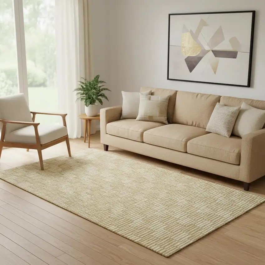 Gold And Ivory Abstract Geometric Washable Area Rug With UV Protection Photo 1