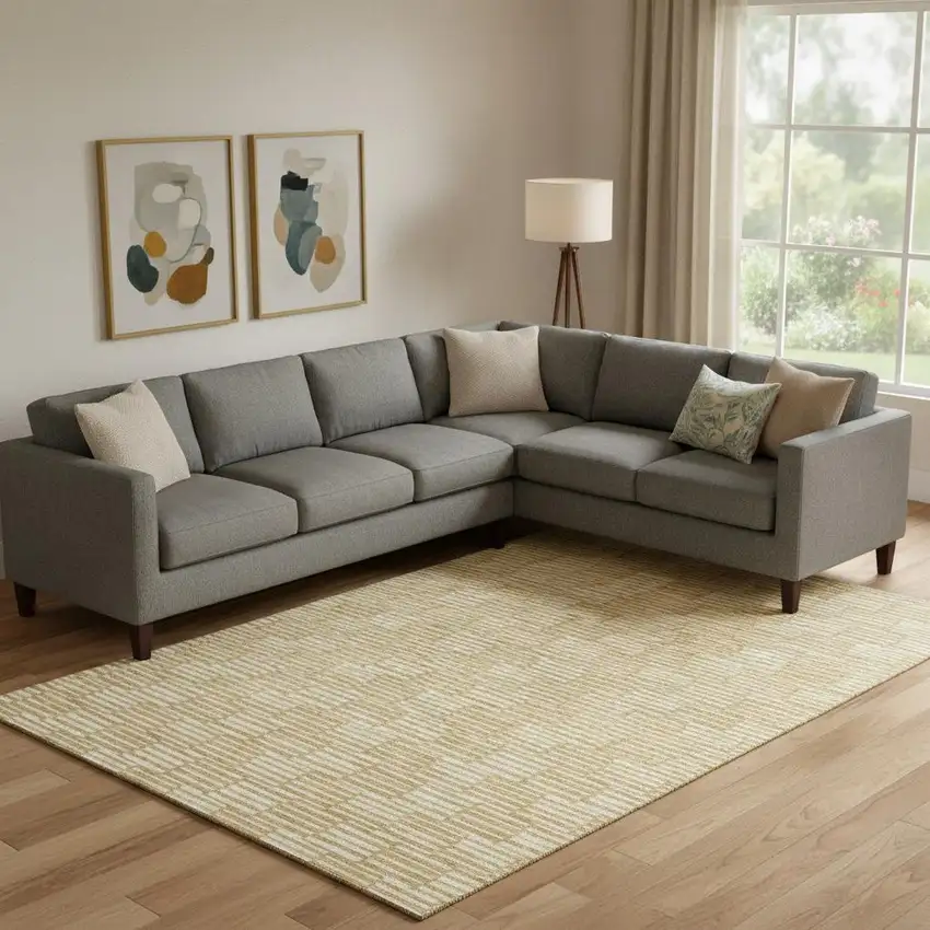 Gold And Ivory Abstract Geometric Washable Area Rug With UV Protection Photo 1