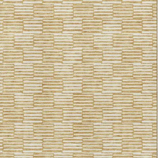 Gold And Ivory Abstract Geometric Washable Area Rug With UV Protection Photo 3