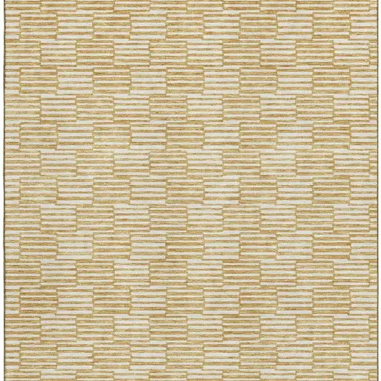 Gold And Ivory Abstract Geometric Washable Area Rug With UV Protection Photo 3