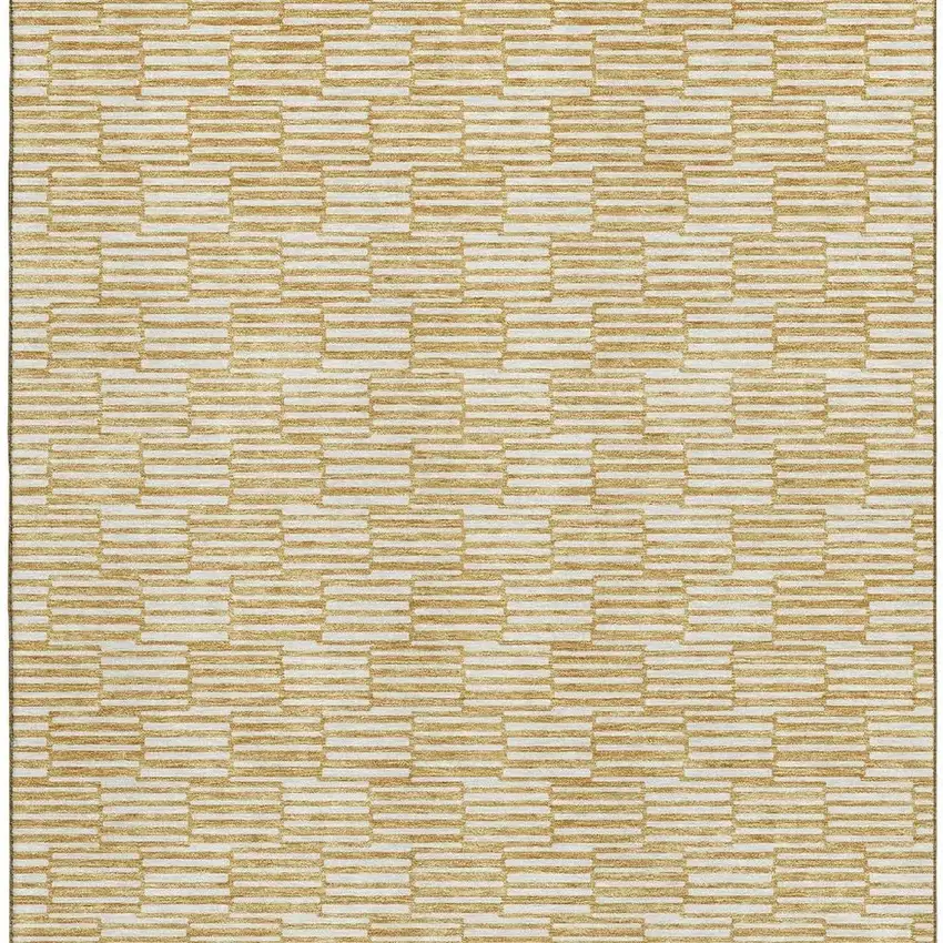 Gold And Ivory Abstract Geometric Washable Area Rug With UV Protection Photo 3