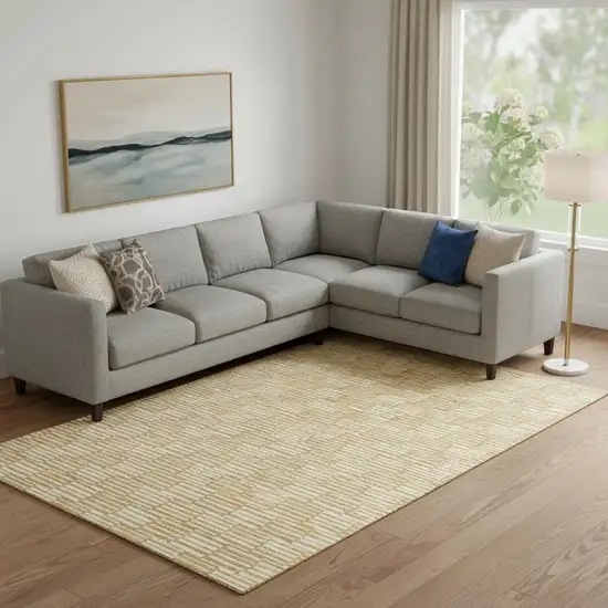 Gold And Ivory Abstract Geometric Washable Area Rug With UV Protection Photo 1