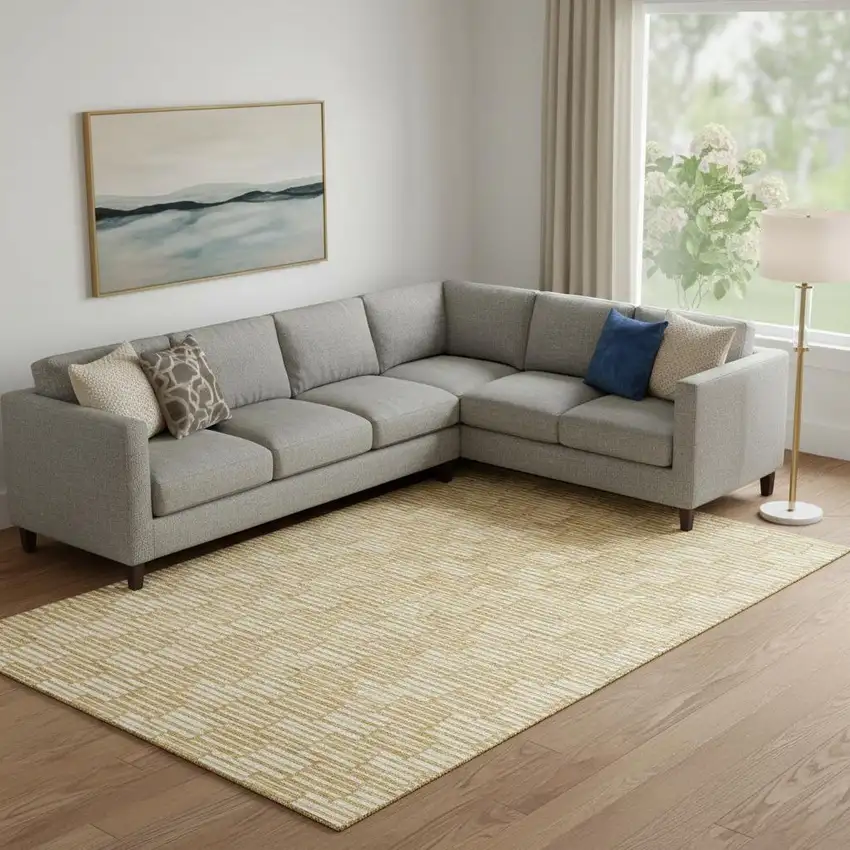 Gold And Ivory Abstract Geometric Washable Area Rug With UV Protection Photo 1