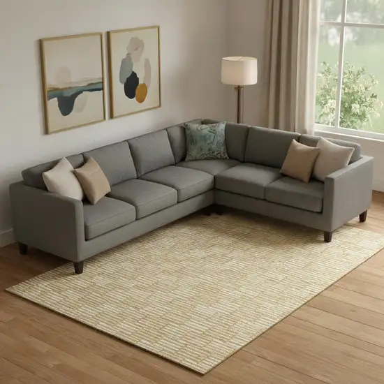 Gold And Ivory Abstract Geometric Washable Area Rug With UV Protection Photo 1