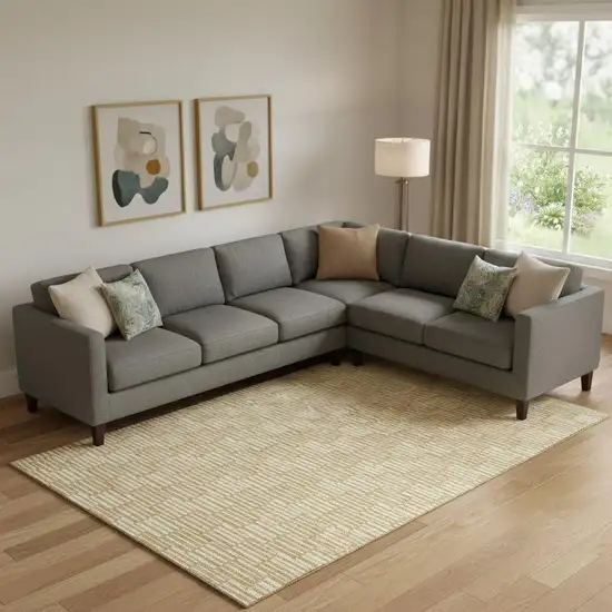 Gold And Ivory Abstract Geometric Washable Area Rug With UV Protection Photo 1