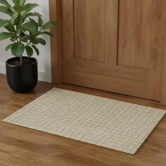 Gold And Ivory Abstract Geometric Washable Area Rug With UV Protection Photo 1