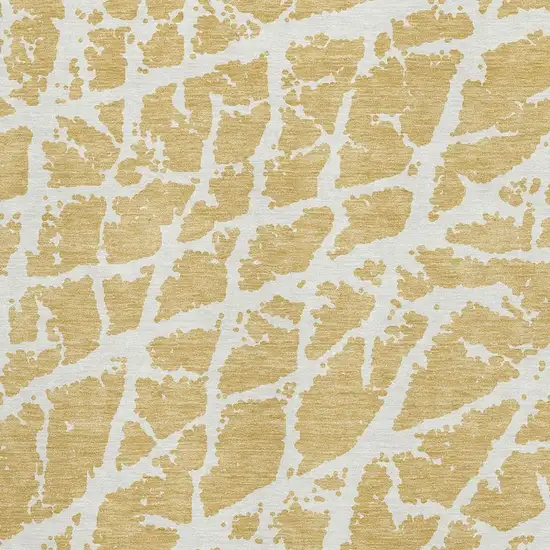 Gold And Ivory Abstract Washable Area Rug With UV Protection Photo 8