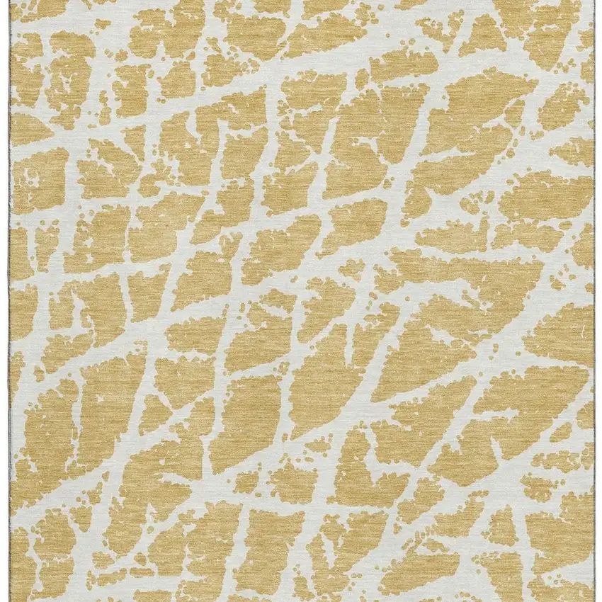 Gold And Ivory Abstract Washable Area Rug With UV Protection Photo 4