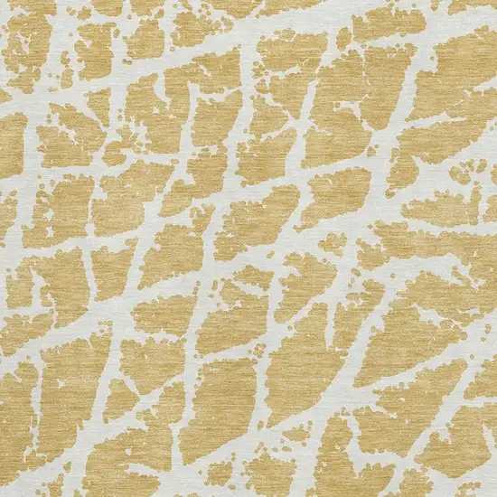 Gold And Ivory Abstract Washable Area Rug With UV Protection Photo 8