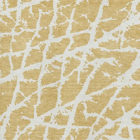 Gold And Ivory Abstract Washable Area Rug With UV Protection Photo 3